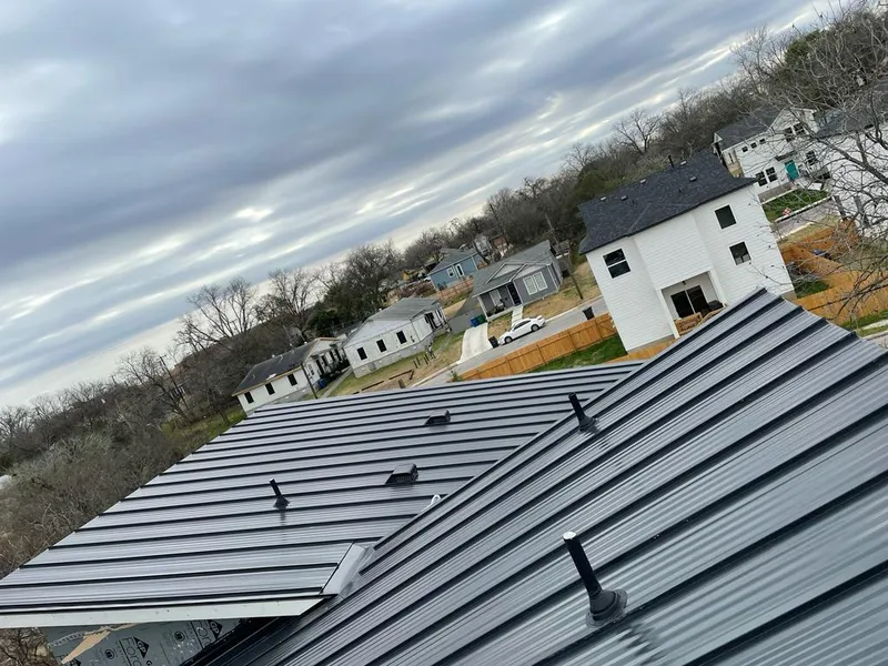 Standing seam metal roof panels with vents for Skylight Repair in Xenia